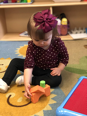 Child playing with blocks